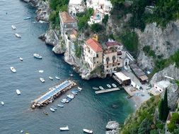 boats on sea at cliff, italy, amalfi coast