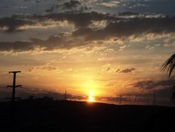 distant view of a sunset on the horizon