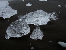 pieces of ice on the beach in Iceland