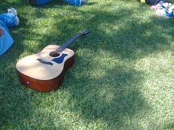 guitar on the green grass