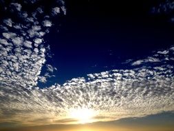 white clouds in the blue sky sunset