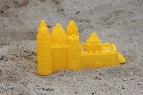 yellow sand toy