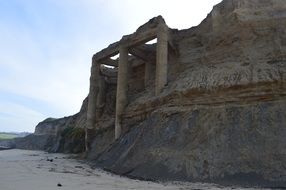 ruins on beach cliff half moon bay