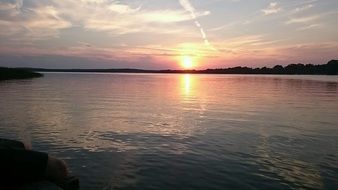 the sun on evening lake scene