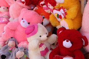 many different colorful soft toys