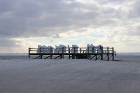 beach clubs on sand at north sea, germany, saint peter ording