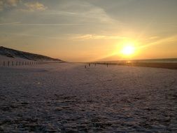 bright sunset on beach in the netherlands