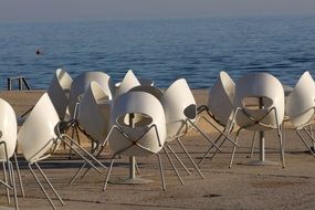 chairs at the seafront restaurant
