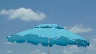 Blue umbrella on a beach