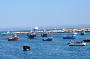 fishing boats in the bay in Cascais, Portugal