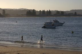 kids and yachts by the sea