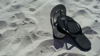 slippers on the sand