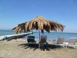Parasol on the sand beach