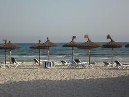 sun loungers on the beach for sunbathing