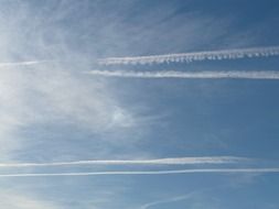 contrail aircraft trail in the blue sky