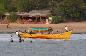 yellow boat for walks off the coast of india