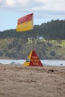 flag at the rescue point on the beach