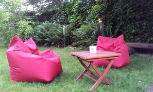 red armchair in a holiday garden