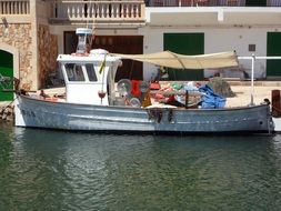 fishing boat at the port in Cala Figuera