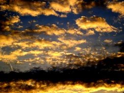 bright golden clouds in the sky