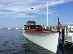 motor boat on water at pier