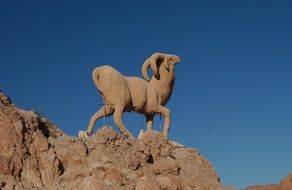 sculpture goat on a rock in Morocco