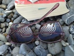 sunglasses on the pebble beach
