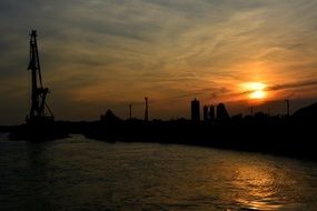 bright colorful sunset in the evening sky cloud water red