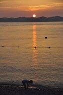 child on the evening beach in the Republic of Korea