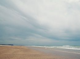 white clouds over the beach