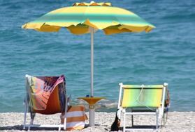 beach chairs and umbrella