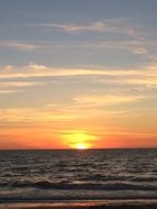 sunset on the horizon on beach