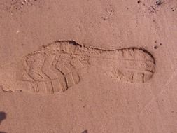 footprint on the sand on beach