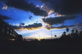 dark clouds over the city at dusk