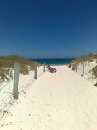 sand beach pathway in summer time