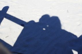 lovers couple shadow on a sand