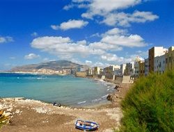 blue boat on the beach in Sicily, Italy