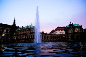 fountain in the center of dresden at dusk