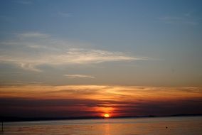 sunset over the horizon lake constance