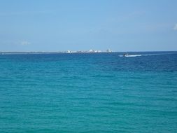 distant view of the shore from the water