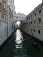 narrow canals between houses in venice