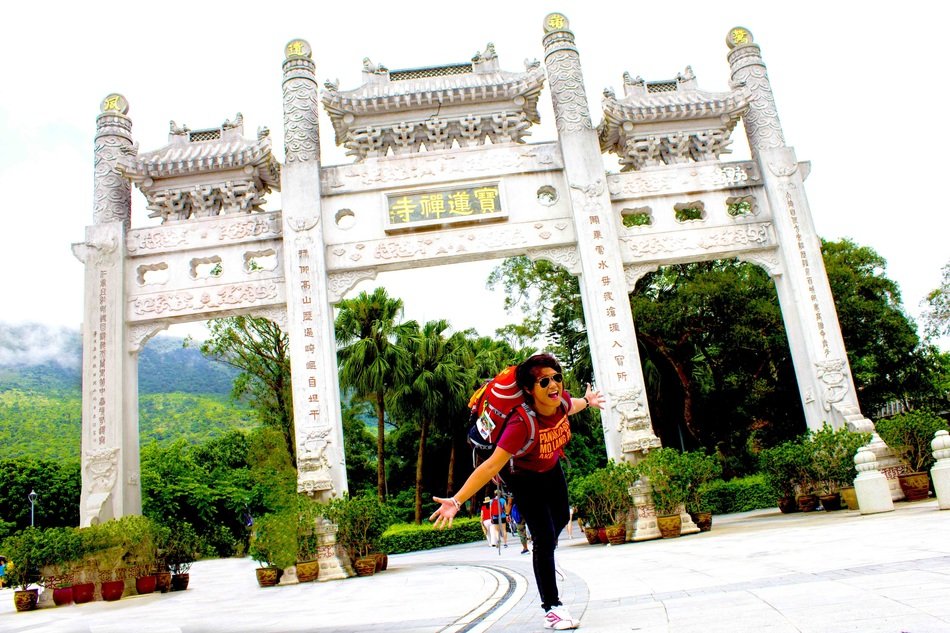 girl in front of a monument in China