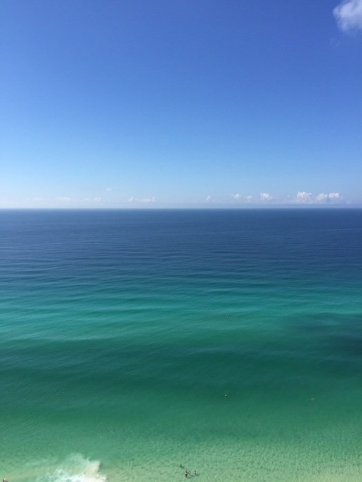 the ocean under the blue sky