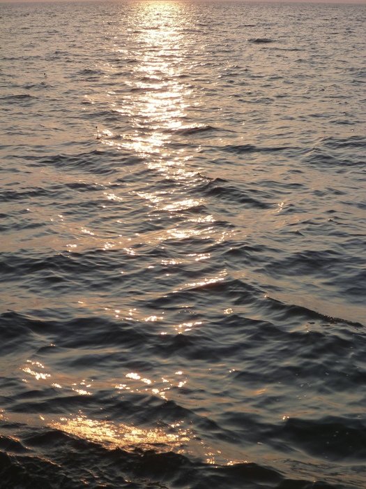 Beautiful sunset on the calm water