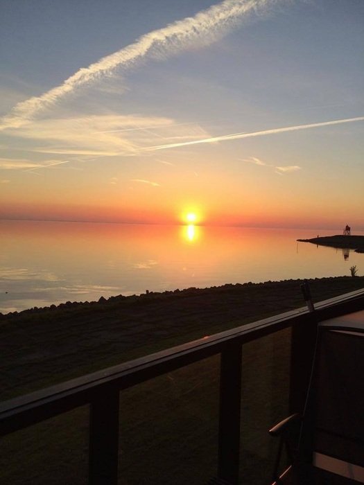 evening sky with the sun over the sea
