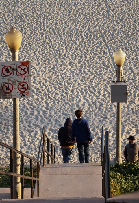 beautiful couple walking on beach