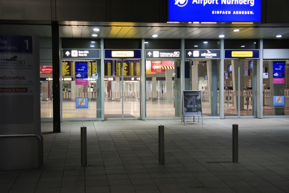 entrance to airport building at night, germany, nuremberg