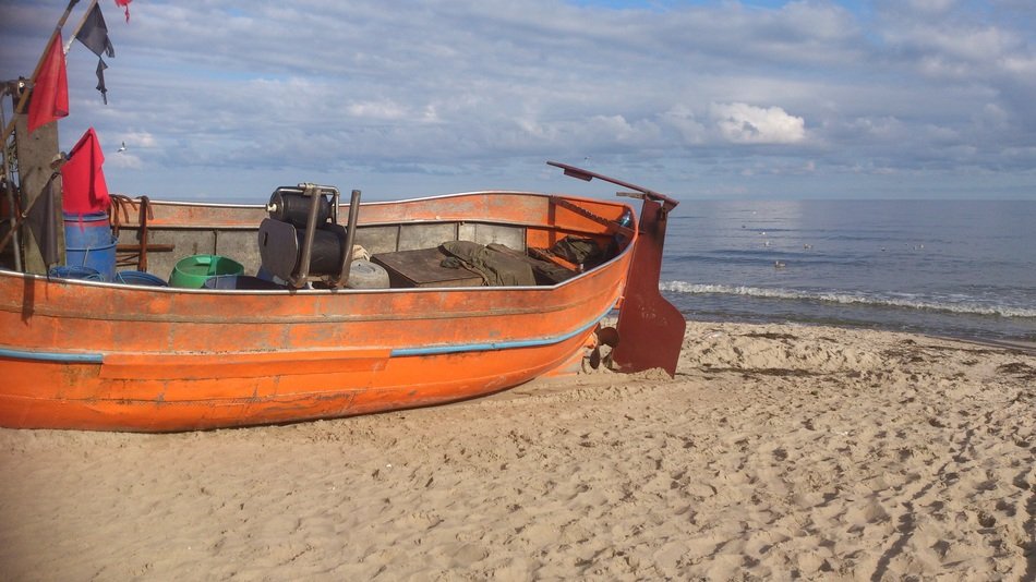 orange cutter on the Baltic Sea