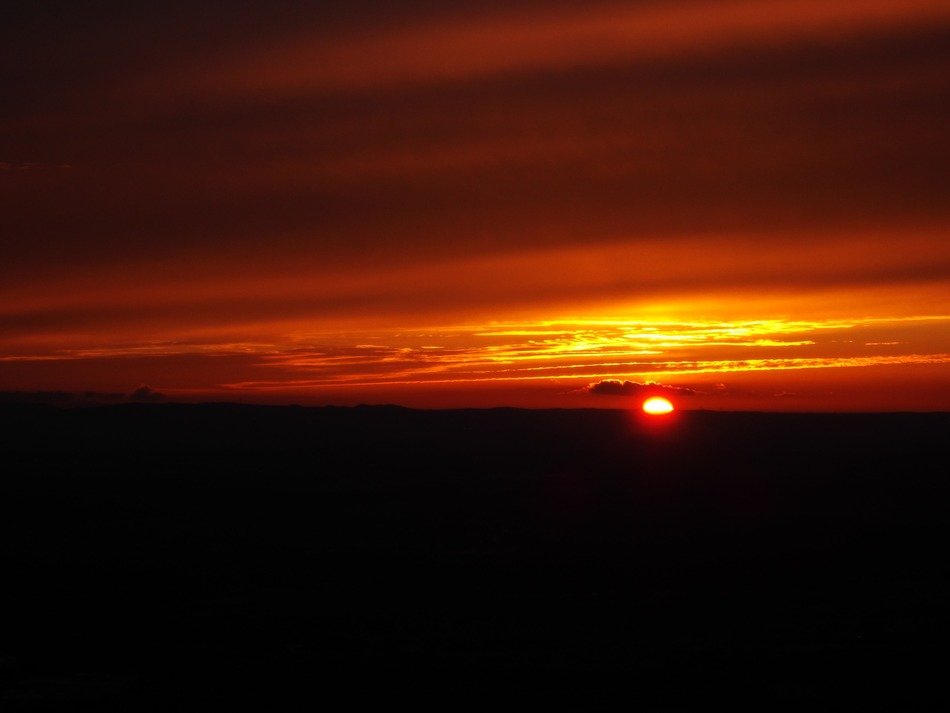 Beautiful red afterglow on the dark horizon