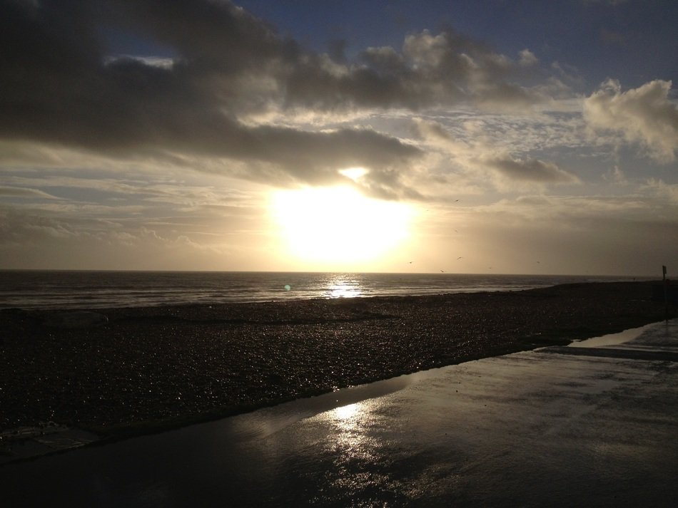 sunset over the coast of england